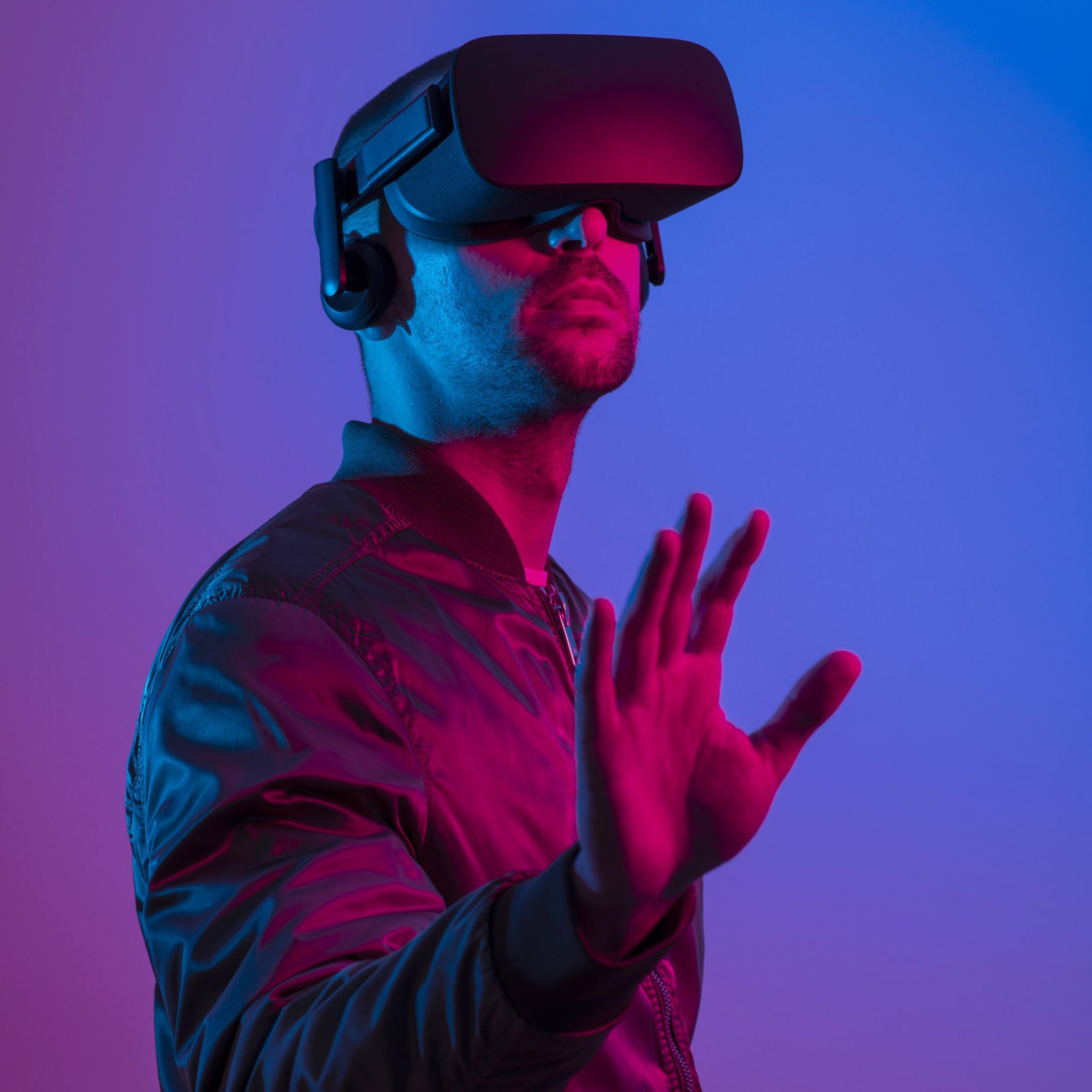 man-wearing-vr-glasses-with-gradient-background-scaled.jpg